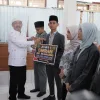 Bupati Pidie Serahkan Bonus Umrah kepada Kafilah MTQ, Pidie Naik ke Peringkat IV Aceh