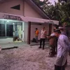 Polisi Evakuasi Jenazah Penjaga Malam di Prabumulih, Barang Milik Korban Diserahkan Utuh kepada Keluarga
